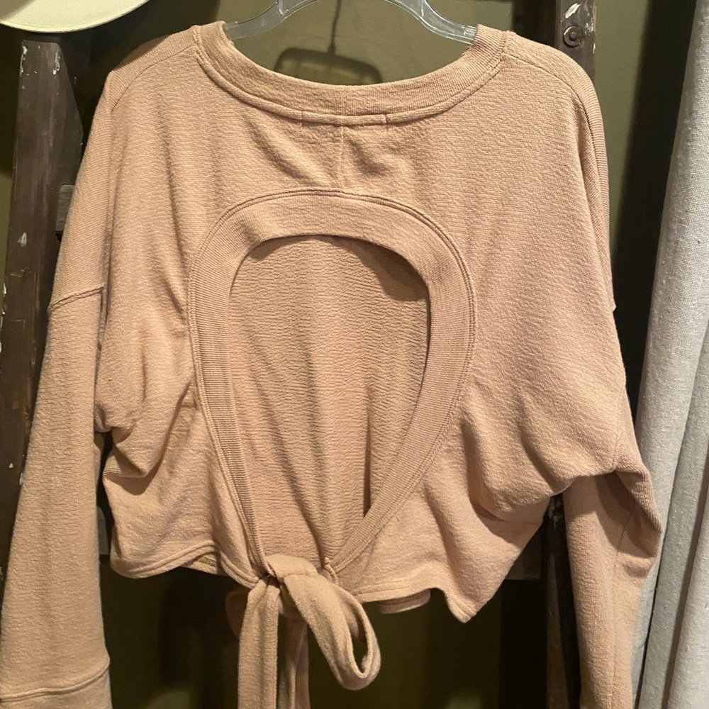 Free People Beach top never worn Size XS. Cute and sexy.